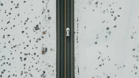 Adventurous road trip along vast, flat wonderland, covered with frosty snow Stock Footage 235585345