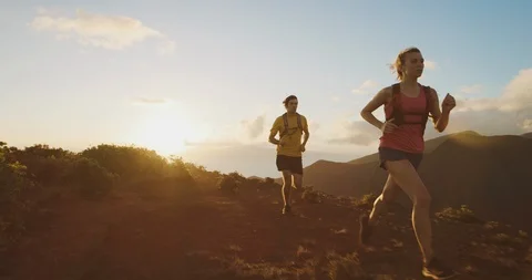 Adventurous runners exploring at sunset Stock Footage 124710180