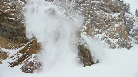 Adventurous skier skiing down snow covered mountainside Stock Footage 116746103
