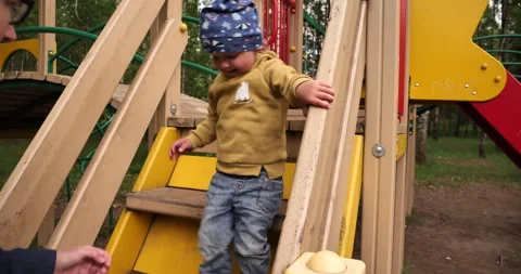 Adventurous Toddler: Conquering Playtime Challenges Stock Footage 243415150
