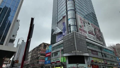 Advertising board almost falls down in  Tsuen Wan , Hong Kong during Typhoon Stock Footage 313432608