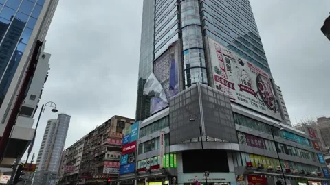 Advertising board almost falls down in  Tsuen Wan , Hong Kong during Typhoon Stock Footage 313432611