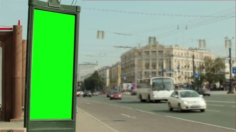 Advertising design with a green background near the road. Stock Footage