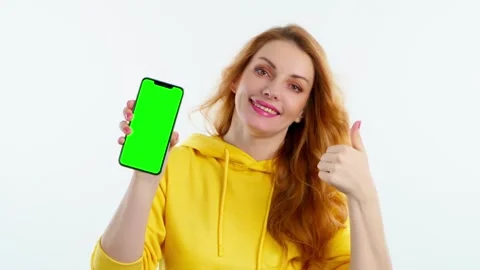Advertising, green screen, chroma key, Yes gesture and woman with phone for prod Stock Footage 257539165