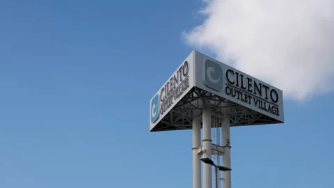 Advertising panel showcasing Outlet Cilento Village shopping destination Stock Footage 319990776