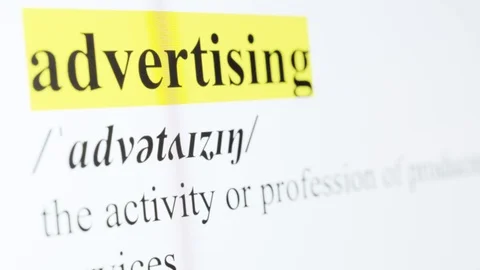 Advertising Text Macro Shot Highlighted in Yellow Color On Computer Screen Stock Footage 123224183