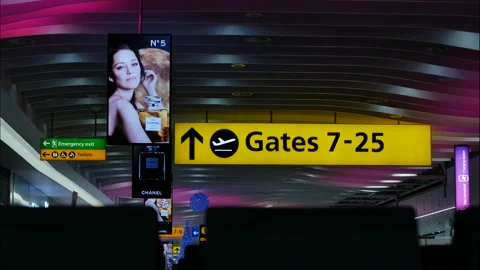 Advertising time lapse next tl flight gate numbers at Heathrow airport 4K Stock Footage 229134761