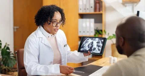 Advice, tablet screen and xray with doctor of patient in office for feedback or Stock Photos