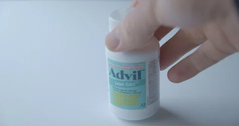 Advil Hand Tabletop Stock Footage 128159109