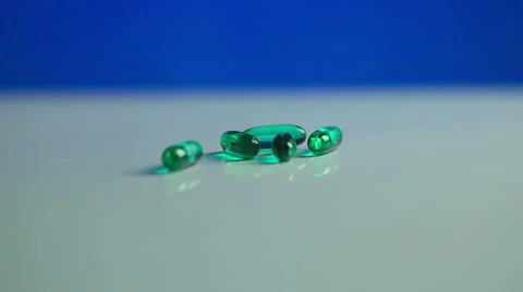 Advil Liquid Gels Dropping in Slow Motion. Stock Footage 58413763