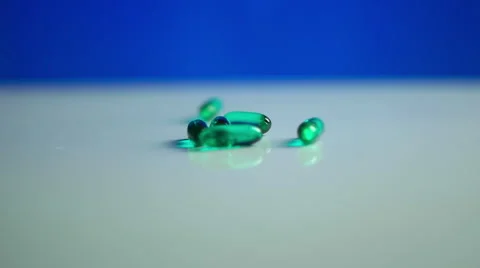 Advil Liquid Gels Dropping in Slow Motion. Stock Footage 58413785