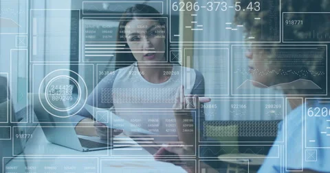 Advisor pulling printed report comparing graphs with laptop data and animated Stock Footage 314182753