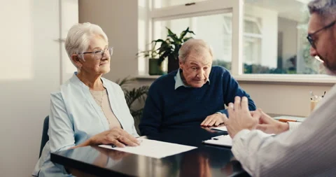 Advisor, talking and old couple at house with document, finance report and Stock Footage 342094977
