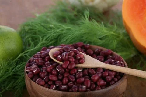 Adzuki Beans on Background with Spoon Stock Photos