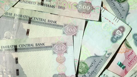 AED dirhams banknotes on the table, slow rotating motion Video stock 277078851