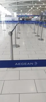 Aegean Airlines check-in queue at Larnaca International Airport Stock Photos