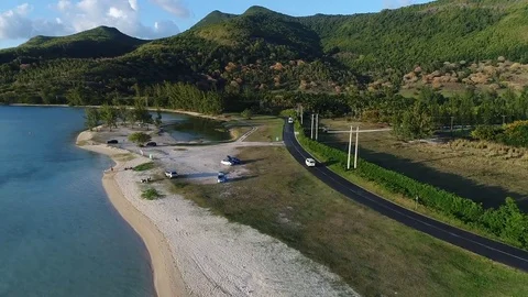 Aeiral view on the shore with the road. Video stock 84279807
