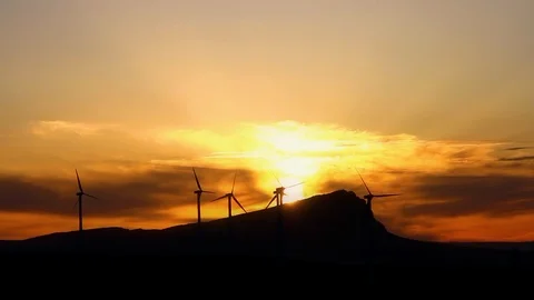 Aeolian generators field suring the sunrise. Stock Footage 106948008