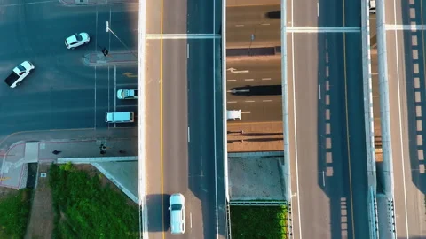 Aerail: top down of traffic intersection and bridges overhead Stock Footage 242011978