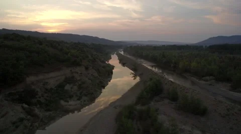 Aeral view over mountain river at sunset - Buzau County - Romania Stock Footage 66878249