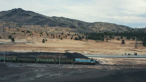 Aeria view; drone moving over railway with train Video stock 112782863