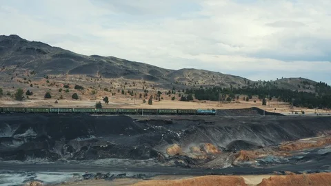 Aeria view; drone moving over railway with train Stock Footage 112783533