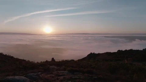 Aeria View Of A Valley Covered By Dense Mist From The Top Of A Mountain Stock Footage 333199280
