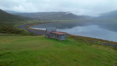 Aerial 360 Degree Spin Around Abandoned A Frame Cabin West Fjords Iceland Stock Footage 258482764
