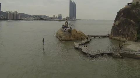AERIAL 4in1 SEQUENCE FLY BY OF GIANT STATUE - CITY SCAPE - BOAT Stock Footage 60796847