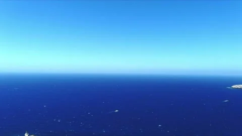 Aerial 4K Blue Sea and Sky Top View Over Akrotiri Lighthouse in Santorini Stock Footage 231418917