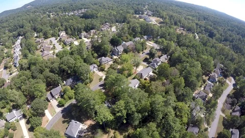 Aerial 4k cinematic helicopter view of Suburbia Stock Footage