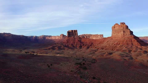 Aerial 4k cinematic view of red rock formations in Valley of the Gods, Utah Stock Footage