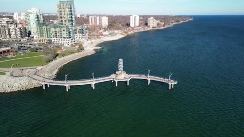 Aerial 4k circular orbit around Brant Street Pier in Burlington Ontario Stock Footage 222500690