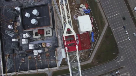 Aerial 4K: Construction crane at a construction site in a city Stock Footage 61441377