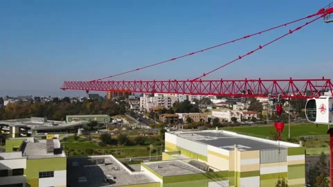 Aerial 4K: Construction Crane On Construction Site During the Afternoon 動画素材 170585695