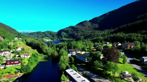 Aerial 4K drone flight view white Norway house-Fotlandsvag Sognfjord reverse Stock Footage 200893449