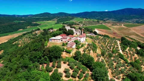 Aerial 4K drone orbit view Nipozzano Castle church Tuscany wine Italy 스톡 동영상 197340449