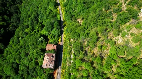 Aerial 4k drone quick reverse view Rail Station Fornello Appennino Tuscany  스톡 동영상 197562198