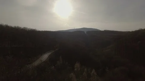 Aerial 4k drone shot above mountains at sunrise Stock Footage 71328024