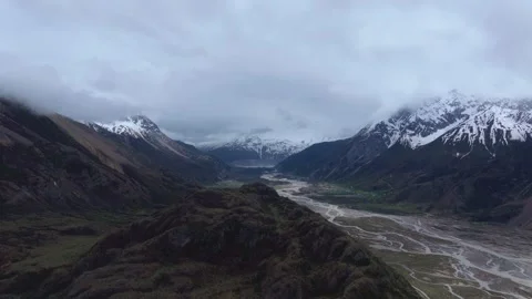 Aerial 4K Drone Time-lapse of Majestic Snow Mountain Peaks and Epic Clouds 库存影片 336857570