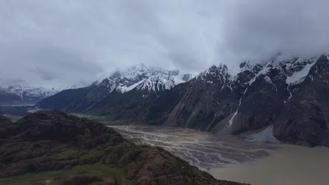 Aerial 4K Drone Time-lapse Thick Rolling Clouds Over Dark Mountain Forest Stock Footage 336857635