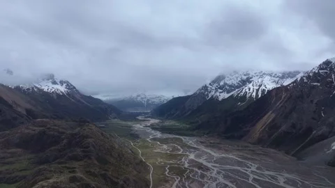 Aerial 4K Drone Time-lapse of Majestic Snow Mountain Peaks and Epic Clouds 库存影片 336857695