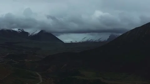 Aerial 4K Drone Time-lapse Thick Rolling Clouds Over Dark Mountain Forest Stock Footage 336857716