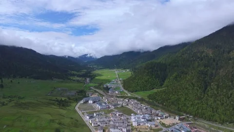 Aerial 4K Drone Time-lapse Thick Rolling Clouds Over Dark Mountain Forest Stock Footage 336857780