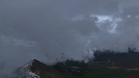 Aerial 4K Drone Time-lapse of Majestic Snow Mountain Peaks and Epic Clouds 库存影片 336857826