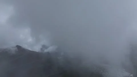 Aerial 4K Drone Time-lapse of Majestic Snow Mountain Peaks and Epic Clouds 스톡 동영상 336857862