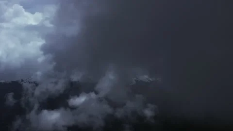 Aerial 4K Drone Time-lapse of Majestic Snow Mountain Peaks and Epic Clouds 库存影片 336857932