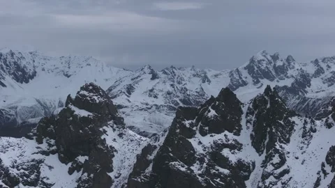 Aerial 4K Drone Time-lapse of Majestic Snow Mountain Peaks and Epic Clouds Video stock 336858517