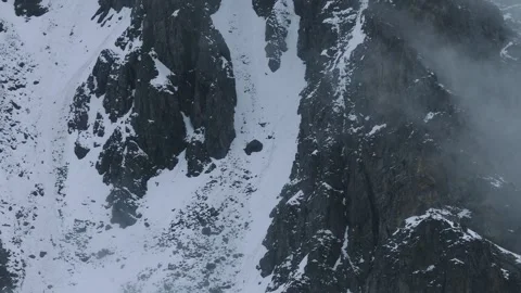 Aerial 4K Drone Time-lapse of Majestic Snow Mountain Peaks and Epic Clouds 库存影片 336858600