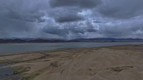 Aerial 4K Drone Time-lapse Thick Rolling Clouds Over Dark Mountain Forest Stock Footage 336858651